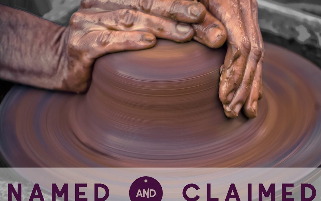 Hands working on pottery wheel