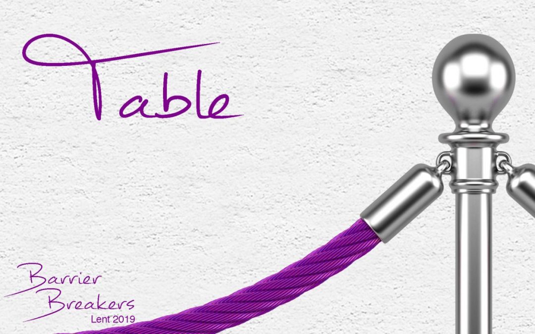 closeup metallic stanchions with rope